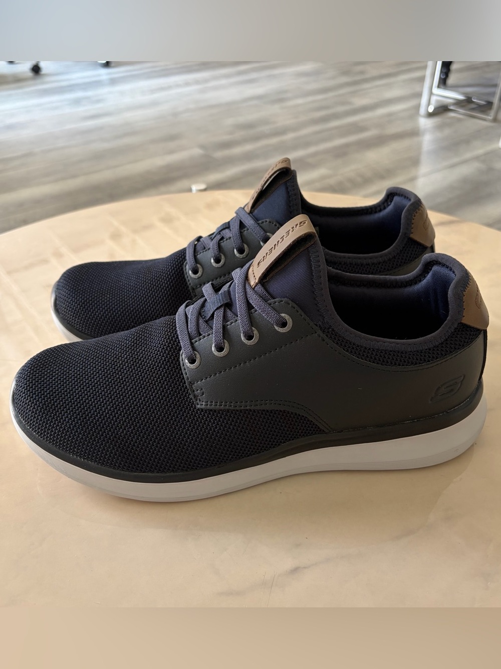 Skechers men's relaxed fit slip on sneakers.
